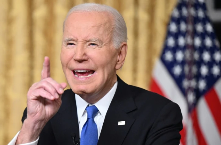 Le président américain sortant Joe Biden prononce son discours d'adieu dans le bureau ovale de la Maison Blanche à Washington, le 15 janvier 2025