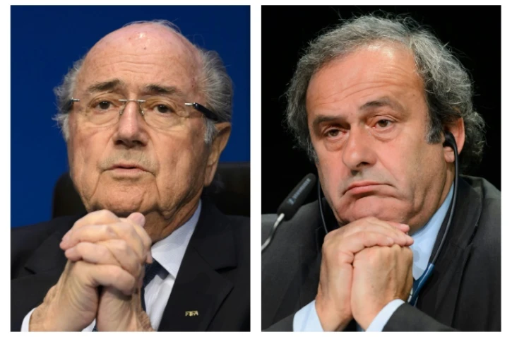 Sepp Blatter, alors président de la Fifa (g), le 30 mai 2015, et le dirigeant de l'UEFA Michel Platini le 28 mai 2015 à Zurich