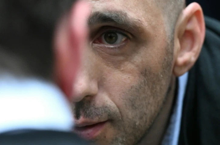 Cédric Jubillar au procès du meurtre de son épouse Delphine, le 23 septembre 2025 à la cour d'assises du Tarn, à Albi ( AFP / Lionel BONAVENTURE )