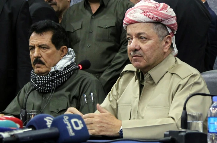 Le président de la région autonome du Kurdistan irakien Massoud Barzani (D) lors d'une réunion à Kirkouk le 12 septembre 2017