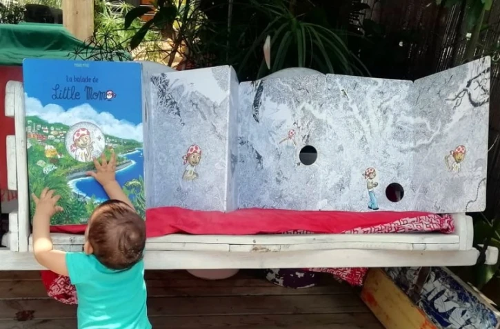 Moniri M'Baé dédicace "La balade de Little Momo" à Saint-Denis 