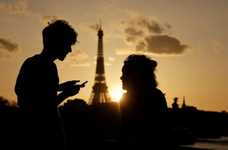 Les couples où la femme contribue plus fortement au revenu commun que son partenaire masculin encourent "un risque plus élevé" de séparation, d'après une étude de l'Institut national d'études démographiques (Ined) ( AFP / Ludovic MARIN )
