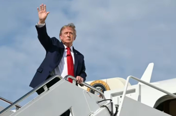Le président américain Donald Trump à Joint Base Andrews, dans le Maryland le 21 août 2026 ( AFP / SAUL LOEB )