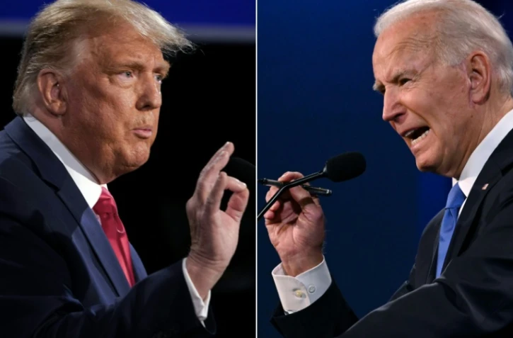 Combinaison de photos créée le 22 octobre 2020: l'ancien président américain Donald Trump (G) et l'actuel président américain Joe Biden alors candidats lors du dernier débat présidentiel à Nashville, aux Etats-Unis, le 22 octobre 2020