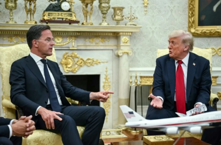 Le président américain Donald Trump et le secrétaire général de l'Otan Mark Rutte dans le Bureau ovale de la Maison Blanche, à Washington, le 14 juillet 2025 ( AFP / ANDREW CABALLERO-REYNOLDS )