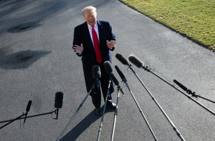 Le président des Etats-Unis Donald Trump s'adresse à des journalistes devant la Maison Blanche le 6 janvier 2019