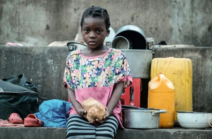 Elena Joaquin, 6 ans, est hébergée avec sa famille dans un abri de Buzi, au Mozambique, le 23 mars 2019