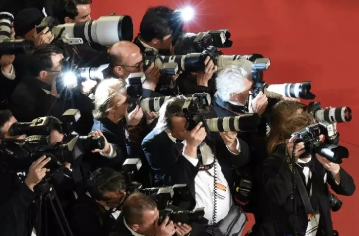 Des photographes lors du festival de Cannes en mai 2015 ( AFP / Loic VENANCE )