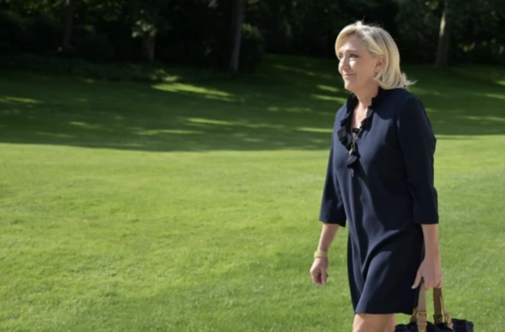La cheffe de file des députés RN Marine Le Pen à l'Elysée, peu avant sa rencontre avec le président de la République, le 26 août 2024