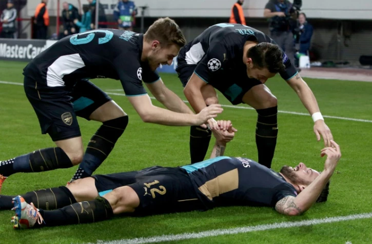 La joie de l'attaquant d'Arsenal Olivier Giroud, auteur d'un triplé contre l'Olympiakos, le 9 décembre 2015 au Pirée