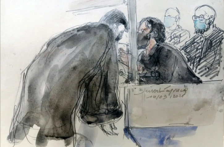 Croquis d'audience réalisé le 14 septembre montrant Salah Abdeslam avec un avocat, au procès des attentats du 13 novembre 2015 à Paris