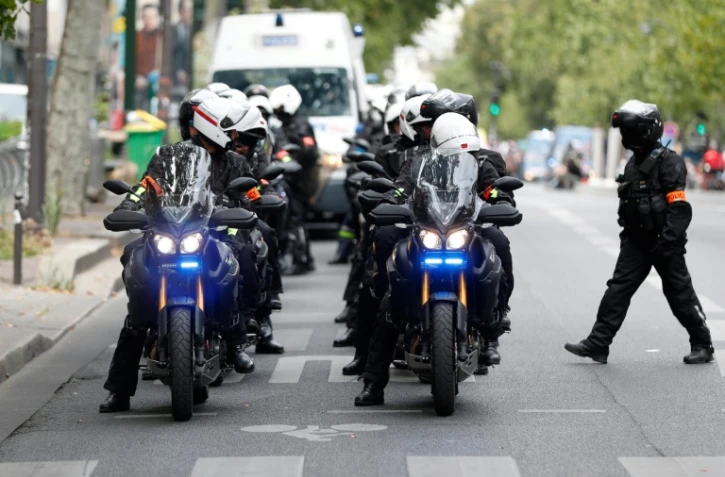 Quelque 130.000 policiers et gendarmes, des unités d'élite et des blindés: dans la foulée des récentes émeutes, le gouvernement a déployé les grands moyens pour tenter de contenir les traditionnels incidents des festivités du 14-Juillet