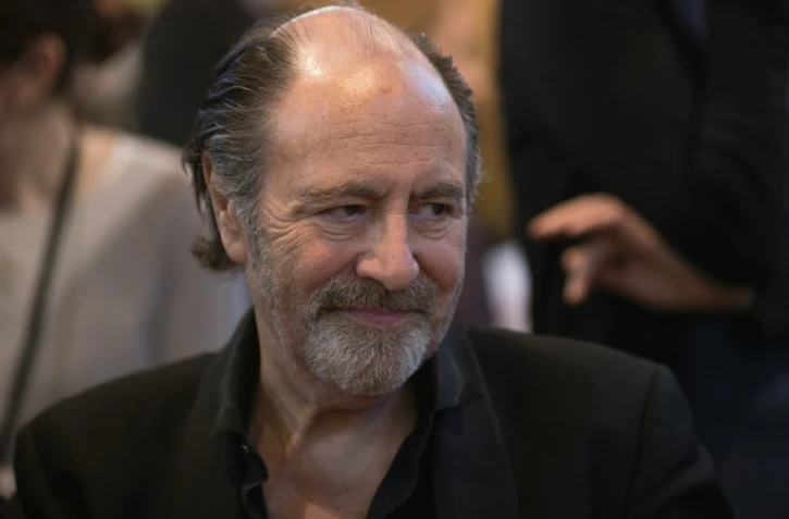 Le chanteur Michel Delpech au Salon du Livre de Paris le 22 mars 2014
