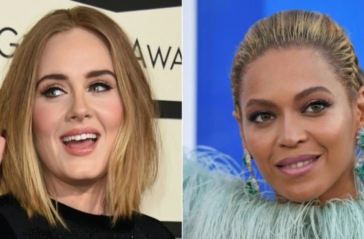 Montage photo réalisé le 6 décembre 2016 des chanteuses Beyoncé (D) et Adele (G) 