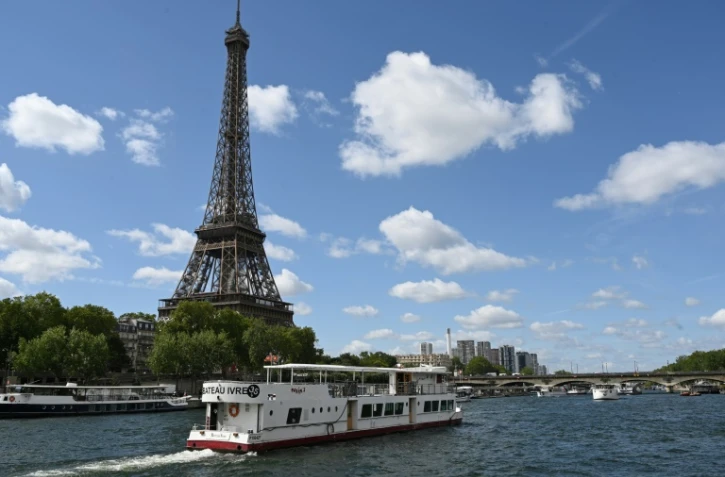 Défilé de bateaux sur la Seine, le 17 juillet 2023, pour tester "manoeuvres", "distances", "durée" et "captation vidéo" de la future cérémonie des JO de Paris en 2024