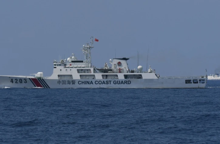 Un bateau des garde-côtes chinois en mer de Chine méridionale, le 16 mai 2024