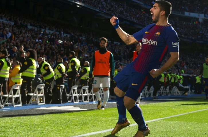 L'attaquant uruguayen du FC Barcelone Luis Suarez exulte après son but dans le clasico face au Real, le 23 décembre 2017 à Madrid