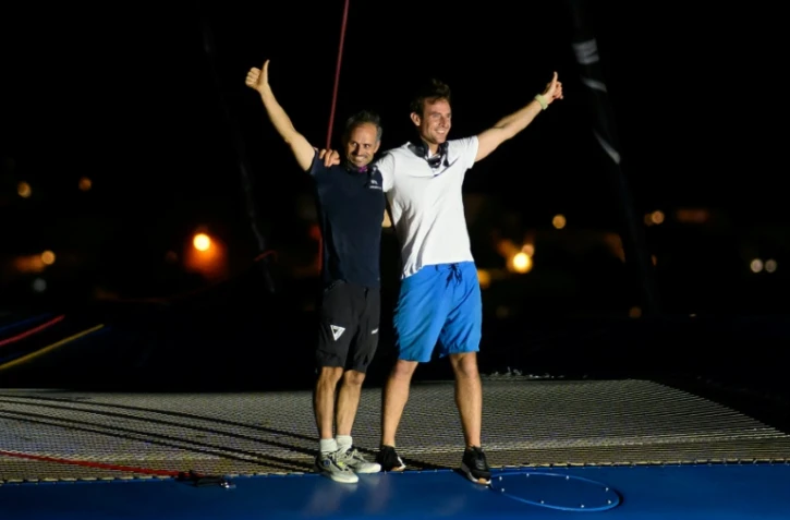 Les skippers Franck Cammas et Tom Laperche à Fort-de-France le 5 novembre après leur victoire dans la Transat Café L'Or.