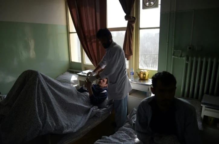 Un soldat afghan blessé est pris en charge dans un hôpital de Kaboul, le 9 mars 2017