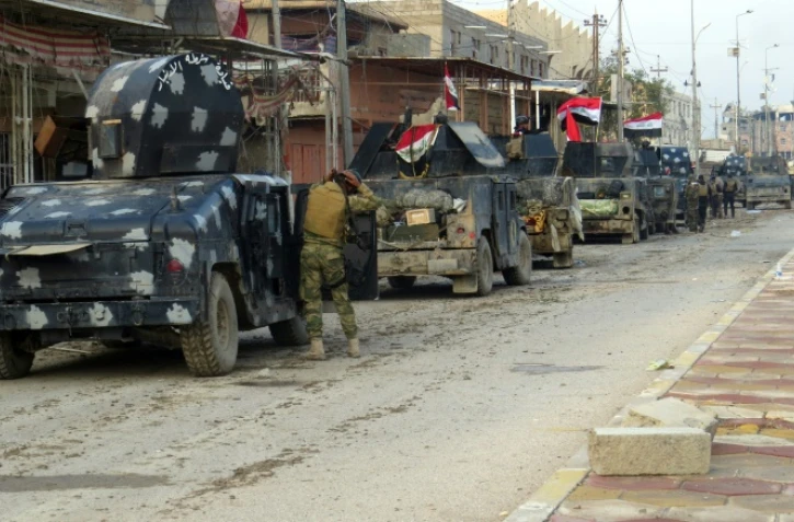 Des forces irakiennes stationnent dans Ramadi pour sécuriser la zone et combattre le groupe EI, le 1er janvier 2016