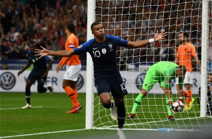 La joie de l'attaquant vedette des Bleus Kylian Mbappé après avoir ouvert le score contre les Pays-Bas au Stade de France, le 9 septembre 2018