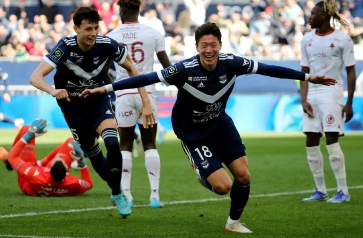 La joie de l'attaquant sud-coréen de Bordeaux Hwang Ui-jo, après avoir marqué le 3e but à domicile face à Metz, lors de la 31e journée de Ligue 1, le 10 avril 2022 au Matmut Stadium