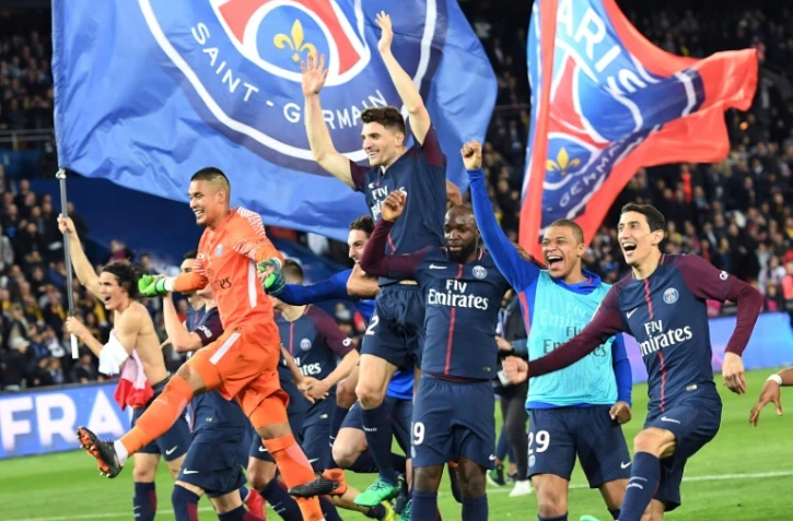 Les joueurs du Paris SG champions de France après leur victoire sur Monaco 7-1 le 15 avril 2018