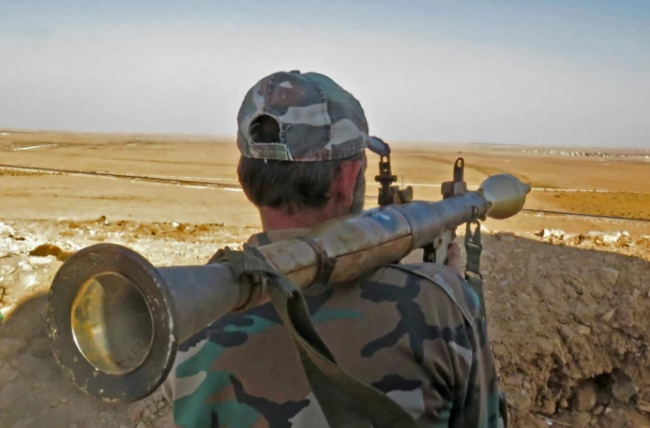 Un membre des forces gouvernementales syriennes le 10 octobre 2016 près de Damas