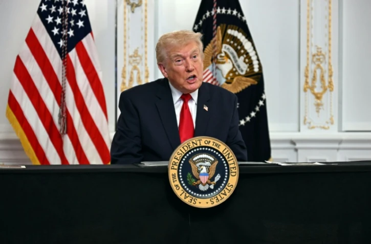 Le président américain Donald Trump participe à un appel vidéo avec des militaires depuis sa résidence de Mar-a-Lago à Palm Beach, en Floride, le 27 novembre 2025