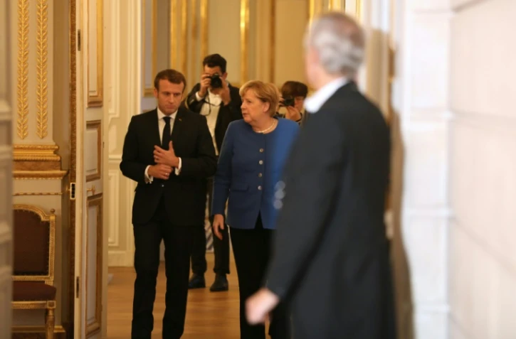 Le président Emmanuel Macron et la chancelière allemande Angela Merkel à l'Elysée, le 13 octobre 2019. 
