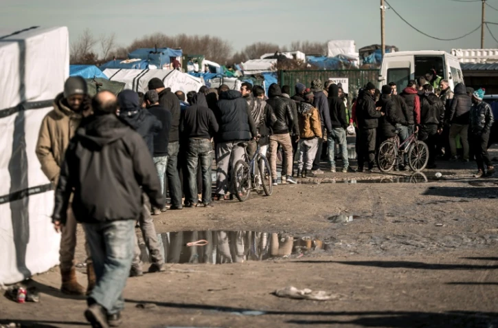 Des migrants dans la "Jungle" de Calais, dans le Pas-de-Calais, le 16 février 2016