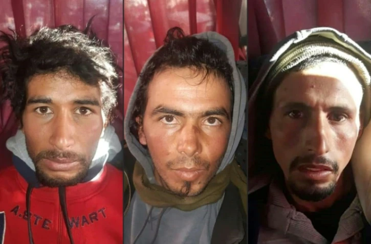 Photo distribuée par la police marocaine montrant les trois suspects interpellés le 20 décembre 2018 dans le cadre de l'enquête sur le meurtre de deux touristes scandinaves, dans le sud du Maroc