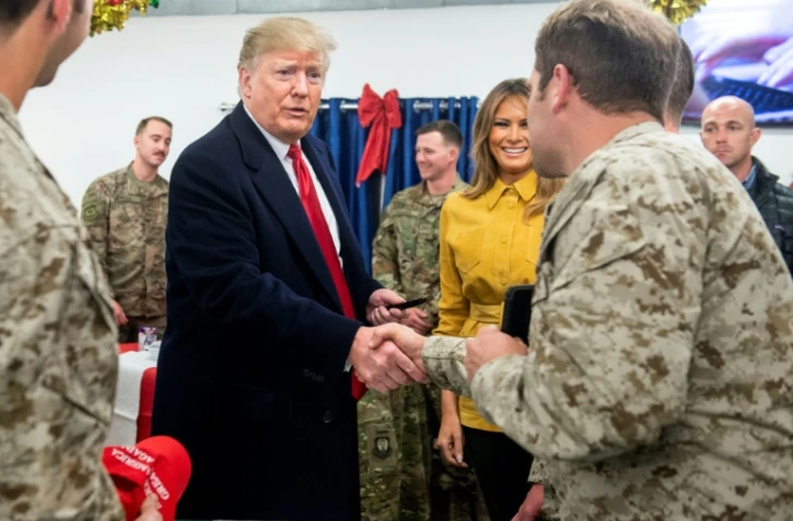 Donald Trump et la Première dame Melania Trump à la rencontre de militaires américains en Irak le 26 décembre 2018
