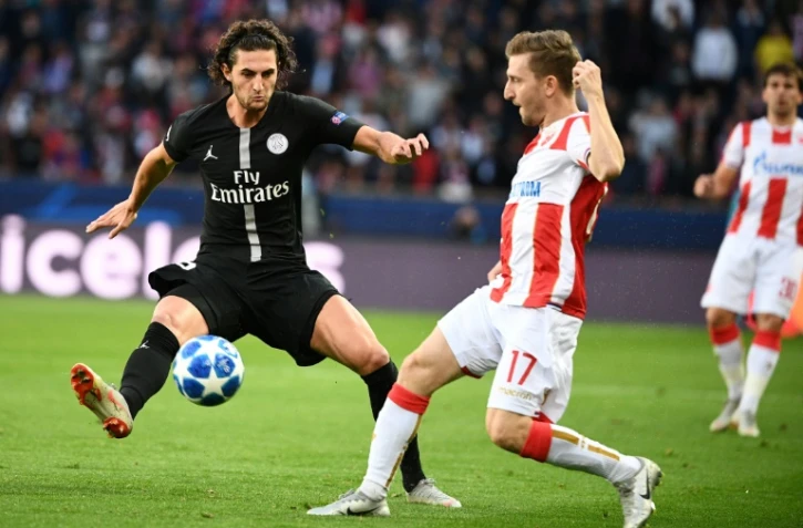 Le milieu de terrain du PSG Adrien Rabiot (g) lors d'un match face à l'Etoile Rouge de Belgrade, le 3 octobre 2018 au Parc des Princes
