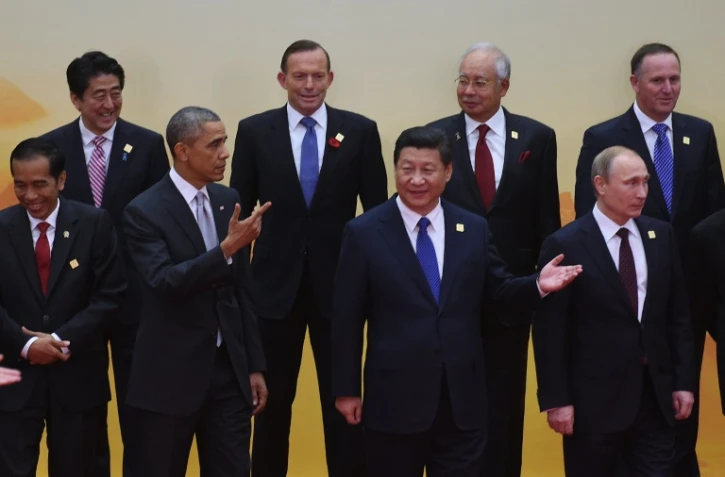 Photo de groupe lors du précédent sommet de l'Apec, en Chine en novembre 2015, avec notamment au premier plan le président américain Barack Obama aux côtés de son homologue chinois Xi Jinping