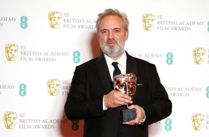 Sam Mendes dont le film "1917" a triomphé à la cérémonie des récompenses britanniques du cinéma à Londres, le 2 février 2020.