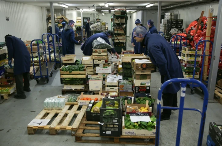 Préparation de caisses de fruits et légumes dans l'entrepôt de Natoora, dans le sud de Londres, le 5 décembre 2018