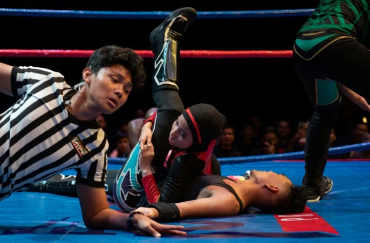 Nor "Phoenix" Diana lors d'un combat de catch face Ă un adversaire masculin, le 6 juillet 2019 Ă Kuala Lumpur