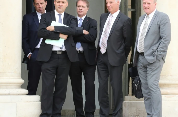 Geoffroy Roux de Bezieux (Medef), Laurent Berger (CFDT), Francois Asselin (CPME), Alain Griset (U2P)et François Hommeril (CFE-CGC) quittent le palais de l'Elysée le 17 juillet 2018, après une rencontre avec Emmanuel Macron
