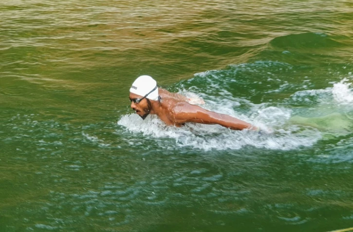 Photo transmise à l'AFP par le nageur SP Likith et prise le 23 avril lors d'un entraînement dans un bassin agricole de la ferme de son entraîner à Adyanadka, dans l'Etat indien du Karnataka