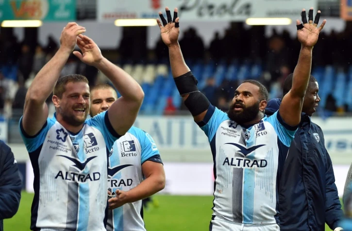 Le Montpelliérain Timoci Naguza (d) et ses coéquipiers heureux après leur victoire à Castres, en Top 14, le 4 mai 2019
