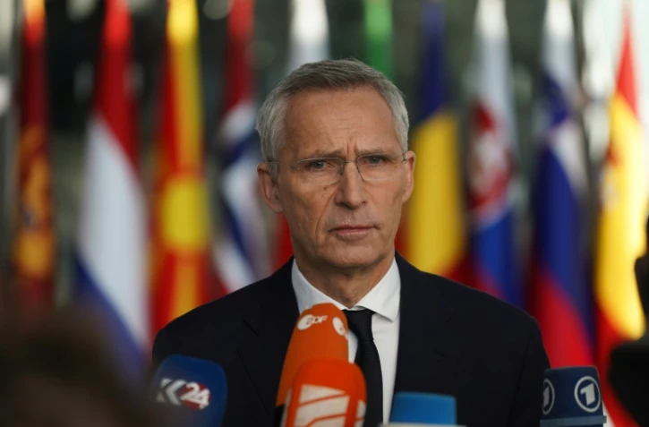 Le secrétaire général de l'Otan Jens Stoltenberg répond aux questions des journalistes avant une réunion des ministres des Affaires étrangères de l'Alliance, le 28 novembre 2023 à Bruxelles