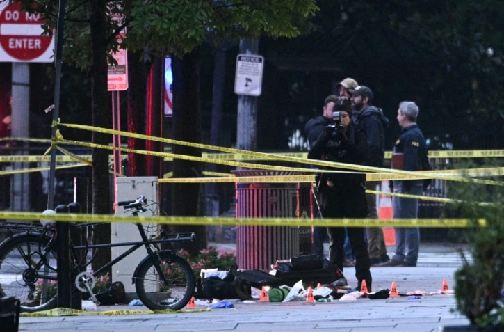 La police scientifique sur les lieux des tirs près de la Maison Blanche à Washington, le 23 mai 2026