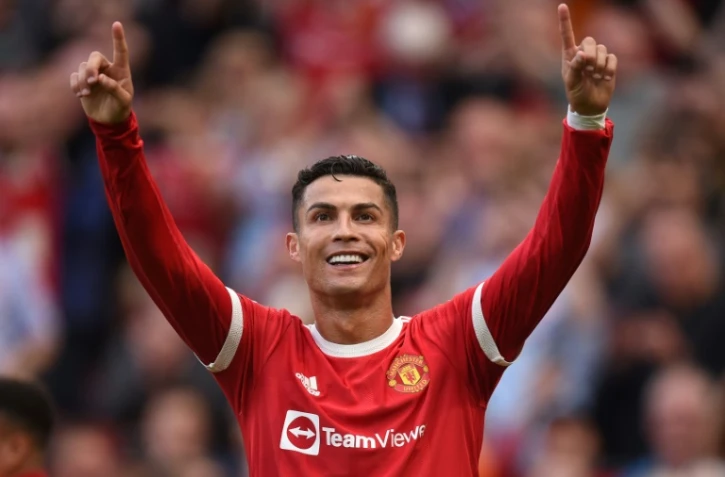 La joie de l'attaquant portugais de Manchester United, Cristiano Ronaldo, après avoir marqué son 2e but face à Newcastle, lors de leur match de Premier League, le 11 septembre 2021 au Stade d'Old Trafford