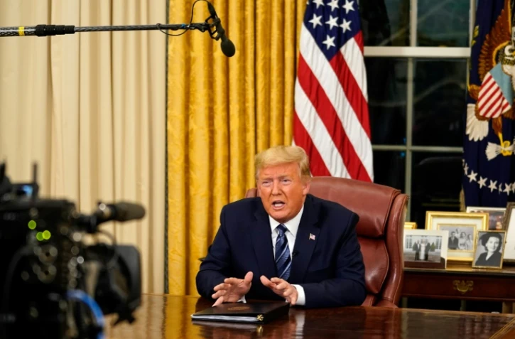Le président américain Donald Trump s'exprime depuis le Bureau ovale le 11 mars 2020 sur l'épidémie de coronavirus