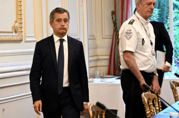 Le ministre de l'Intérieur Gérald Darmanin (G)et le directeur général de la police nationale Frédéric Veaux, à Paris le 27 juillet 2023