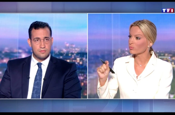 Capture d'écran réalisée le 27 juillet 2018 de l'interview enregistrée et diffusée au 20H00 de TF1 montrant Alexandre Benalla, l'ex-collaborateur du président Emmanuel Macron répondant aux questions de la journaliste Audrea Crespo-Mara