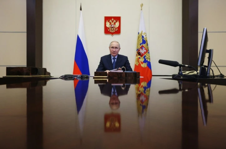 Le président russe Vladimir Poutine dirige une réunion à Moscou, le 11 avril 2023