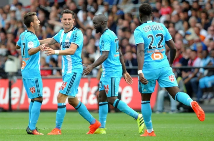 Les Marseillais fêtent le but de Florian Thauvin contre Guingamp au stade du Roudourou, le 21 août 2016