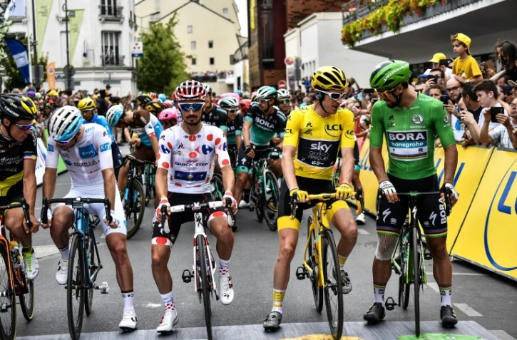Le Français Julian Alaphilippe (à g.), le Britannique Geraint Thomas et le Slovaque Peter Sagan, avant le départ de la dernière étape du TDF, à Houilles, le 29 juillet 2018